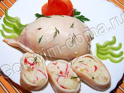 Кальмары, фаршированные рисом и крабовыми палочками Кальмары, фаршированные рисом и крабовыми палочками