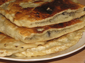 Жареные пирожки с картофелем и шампиньонами Жареные пирожки с картофелем и шампиньонами